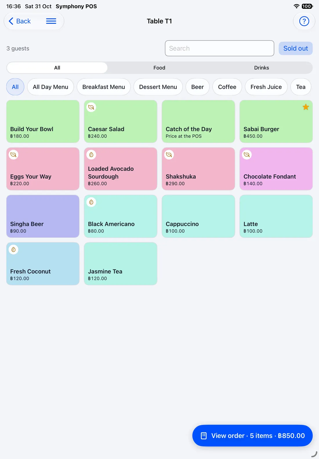 The Symphony till on an iPad: menu tiles by category, with the order total in the bar at the bottom.